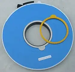Full-size, half-inch tape reel with write enable rings