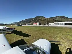 Photo of Zell am See Airport in front of two airplanes