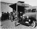 Project Bookmobile visiting the school at Llano San Juan to circulate books, show educational films, and sell defense stamps, in December 1941.