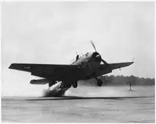 A Grumman TBF Avenger torpedo bomber taking off with the aid of 330 horsepower (250&nbsp;kW) jet-assisted unit in about half the normal run.