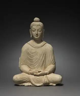 Statue of seated Buddha; c. 300s; overall: 14½" (36.9&nbsp;cm); from Hadda (Afghanistan); Cleveland Museum of Art (Cleveland, Ohio, US)